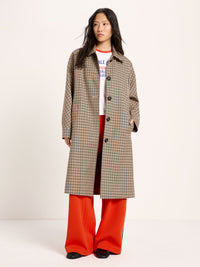 Manteau à carreaux LANIUS Noir & beige – vue de face, porté ouvert sur un pantalon large orange
